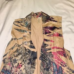 Brown and "western" vest with frillies at bottom
